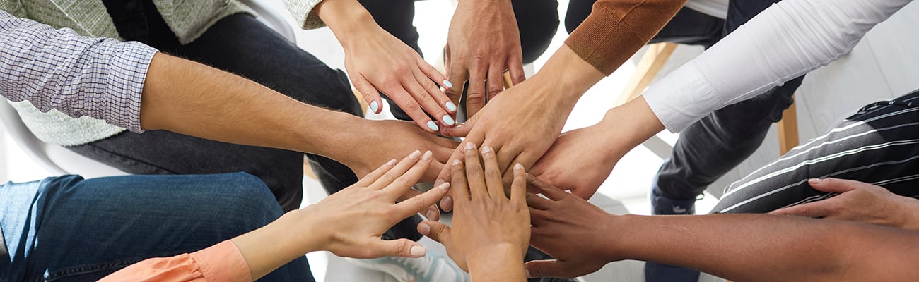 teamwork-hands-in-circle